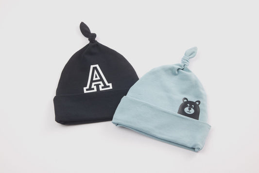 Gorro de bebé con moño