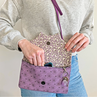 Pochette con patta a ragnatela